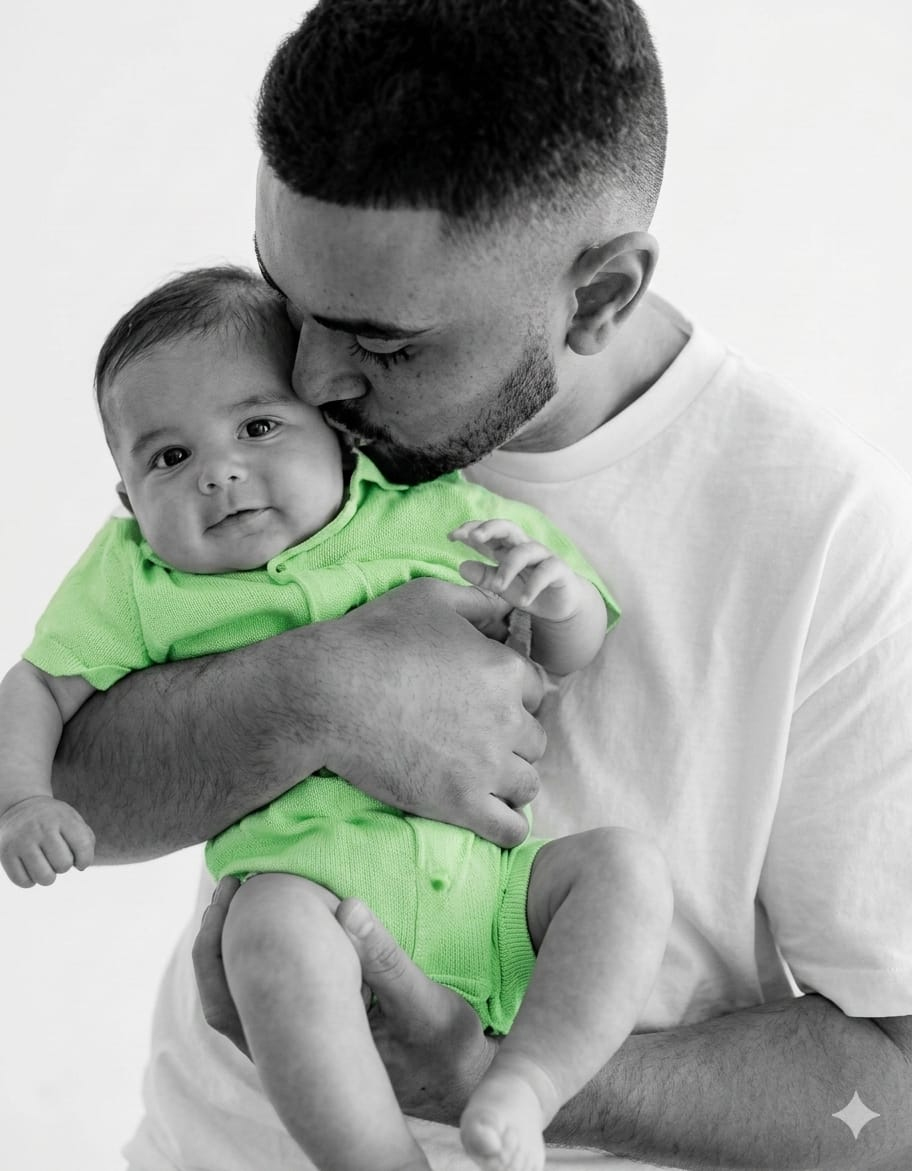 Father with baby representing family welfare and growth